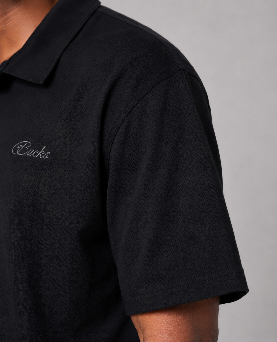 black polo shirt